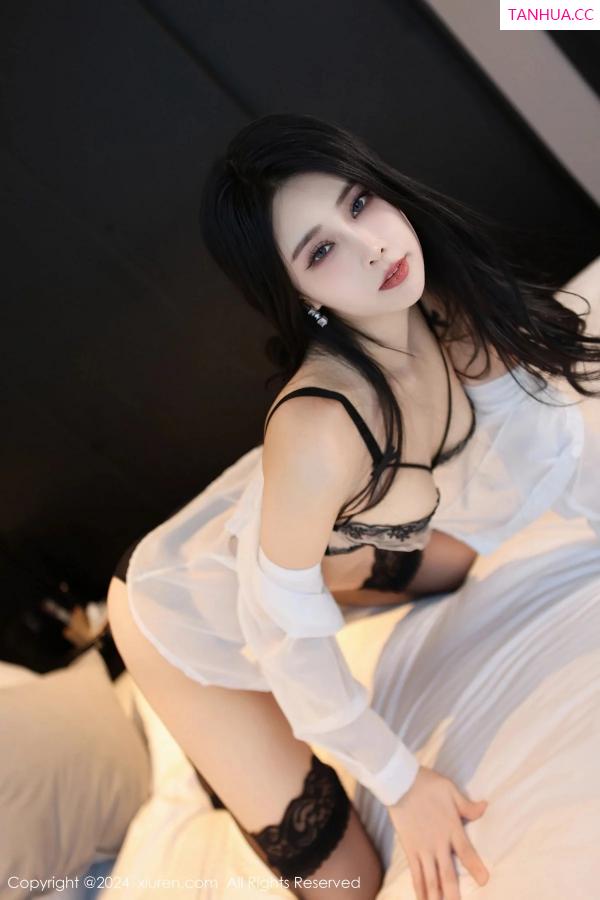 草莓  [XiuRen]高清写真图 2024.01.02 No.7896 草莓mm 黑丝美腿第56张图片